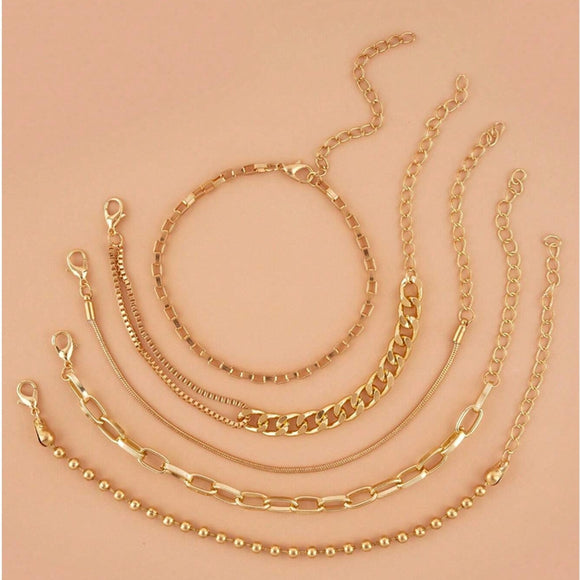 A golden six-piece set Chic Multi-Layered Alloy Bracelet Set - Fashionable Stackable Jewelry