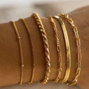 A golden six-piece set Chic Multi-Layered Alloy Bracelet Set - Fashionable Stackable Jewelry-1