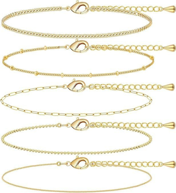 A golden six - piece set Chic Multi - Layered Alloy Bracelet Set - Fashionable Stackable Jewelry - RnR Galore