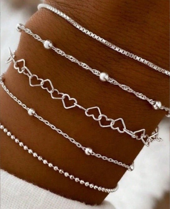 A Silver six - piece set Chic Multi - Layered Alloy Bracelet Set - Fashionable Stackable Jewelry - RnR Galore