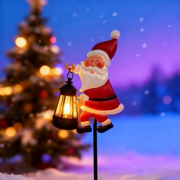 Warm white light Solar Powered Christmas Garden Stake - Metal Santa Claus with Glowing Lantern - Warm White LED Outdoor Decoration - 82cm Height - RnR Galore