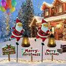 Warm white light Solar Powered Christmas Garden Stake - Metal Santa Claus with Glowing Lantern - Warm White LED Outdoor Decoration - 82cm Height - RnR Galore