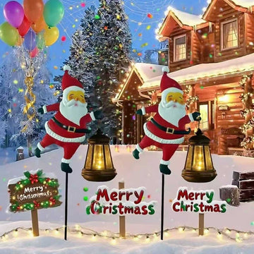 Warm white light Solar Powered Christmas Garden Stake - Metal Santa Claus with Glowing Lantern - Warm White LED Outdoor Decoration - 82cm Height - RnR Galore